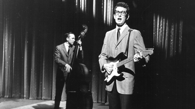 Illustration for article titled Remembering A Legend: 5 Times Buddy Holly Performed In Front Of An Audience Of 2,000 Fortune-Tellers All Screaming At Him To Never Get On An Airplane